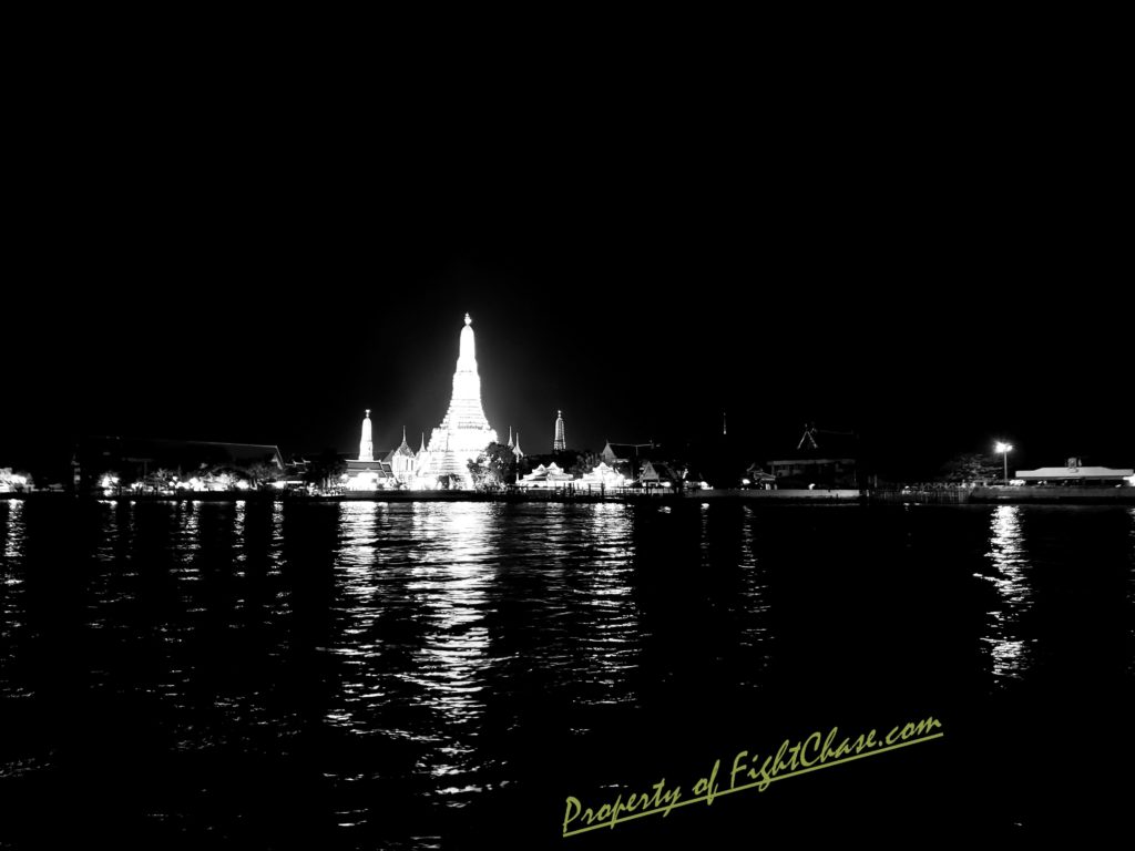 Wat Arun at night from across the river. Bangkok Thailand